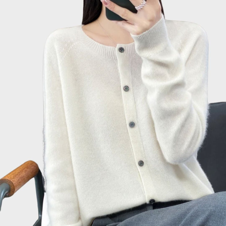Bella cardigan in black styled with tailored trousers for a chic, work-ready outfit