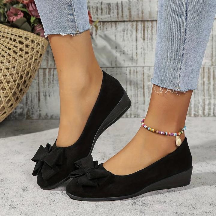 Black Bella ballet flats, sole and heel view