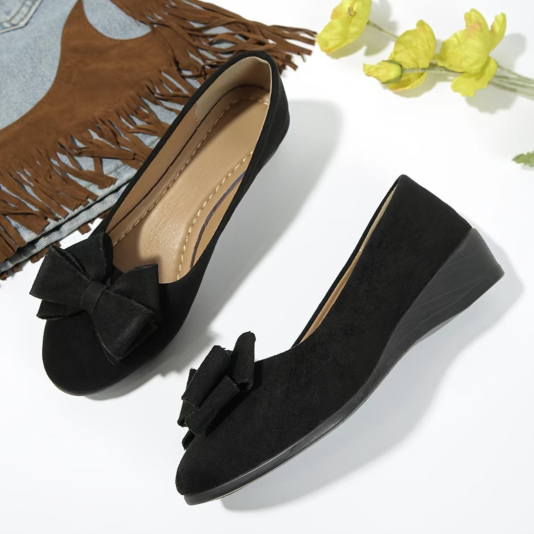 Blue Bella ballet flat, top-down view highlighting fabric bow