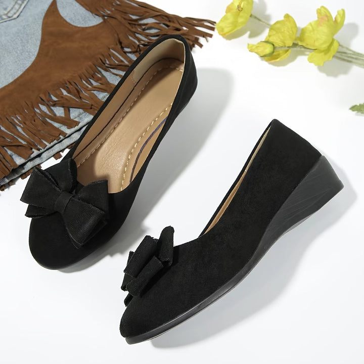 Blue Bella ballet flat, top-down view highlighting fabric bow