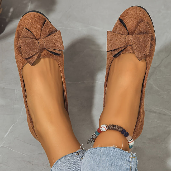 Brown Bella ballet flat, top-down view showing fabric bow accent