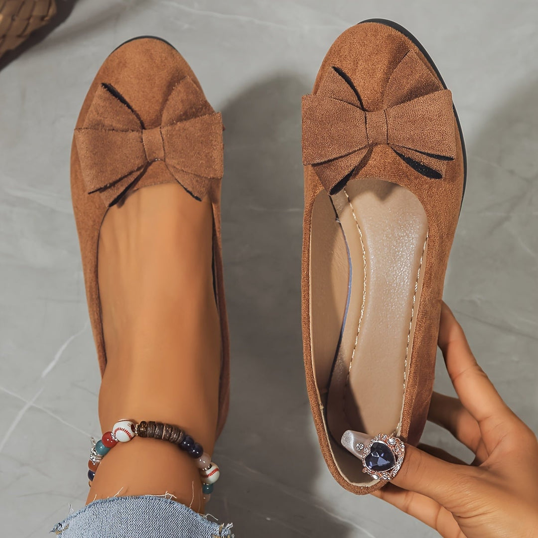 Brown Bella ballet flats, sole and heel view