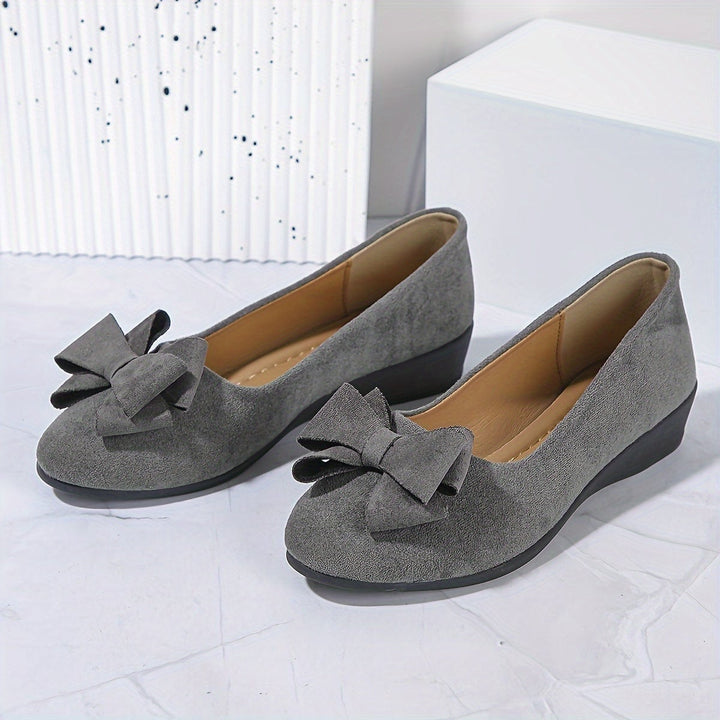 Bella bow ballet flats in gray styled with jeans, lifestyle shot