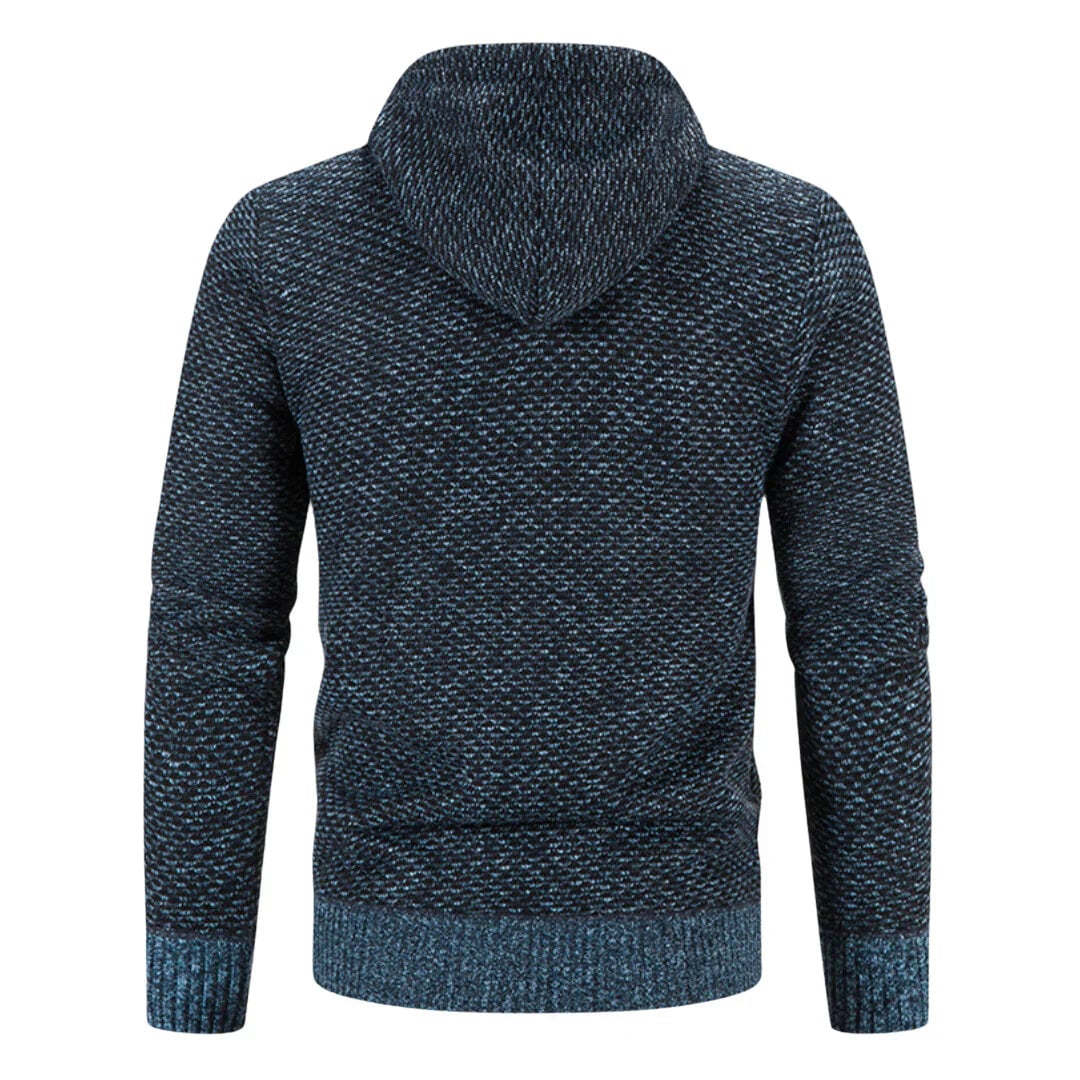 Side profile of a woman wearing a cozy knit sweater vest with insulating lining