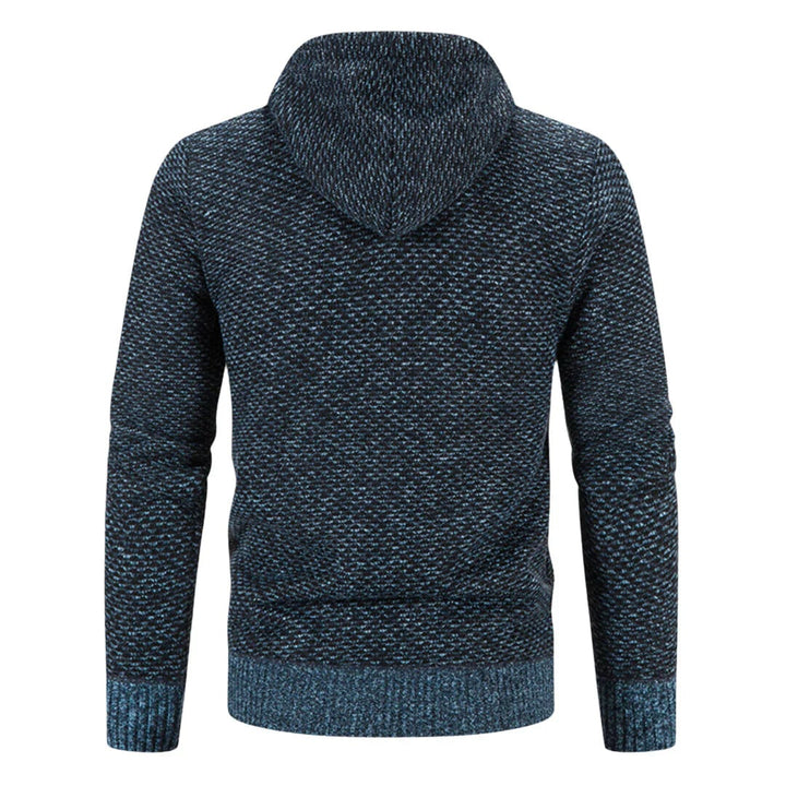 Side profile of a woman wearing a cozy knit sweater vest with insulating lining