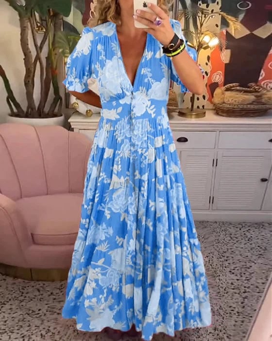 Woman wearing a blue soft grace maxi dress with an airy, lightweight silhouette perfect for summer