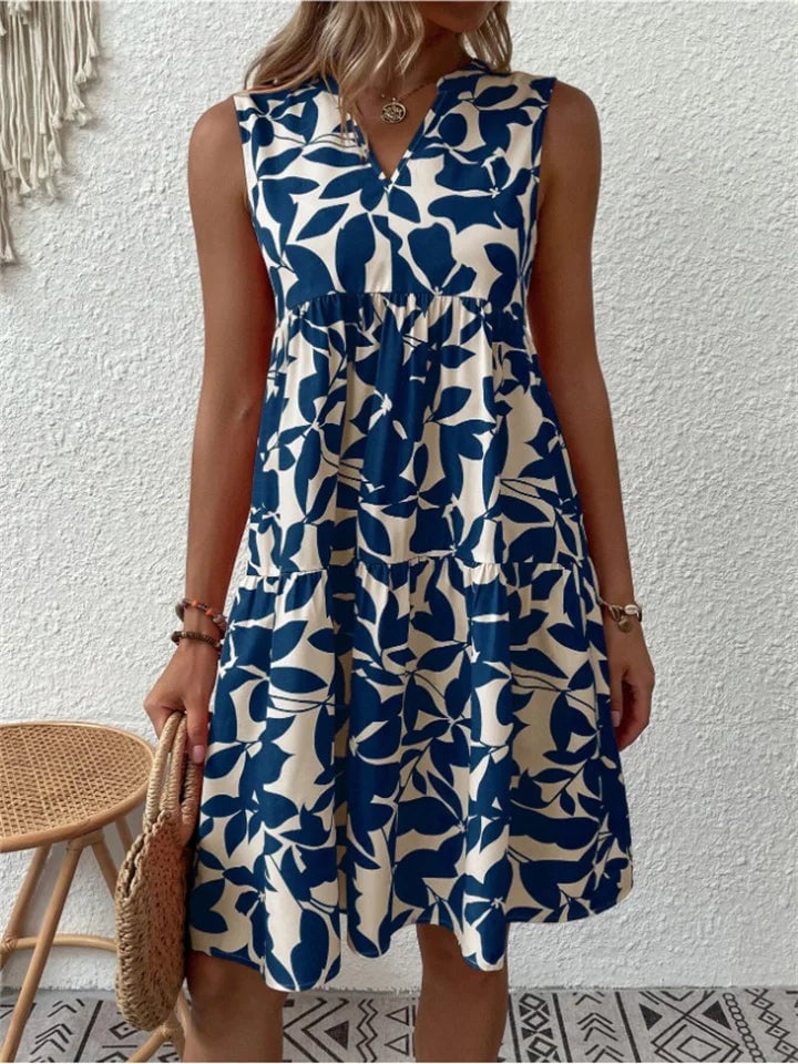 Close-up of the Beverly flowy dress showing its elegant drape and relaxed, flattering fit through the waist and hips