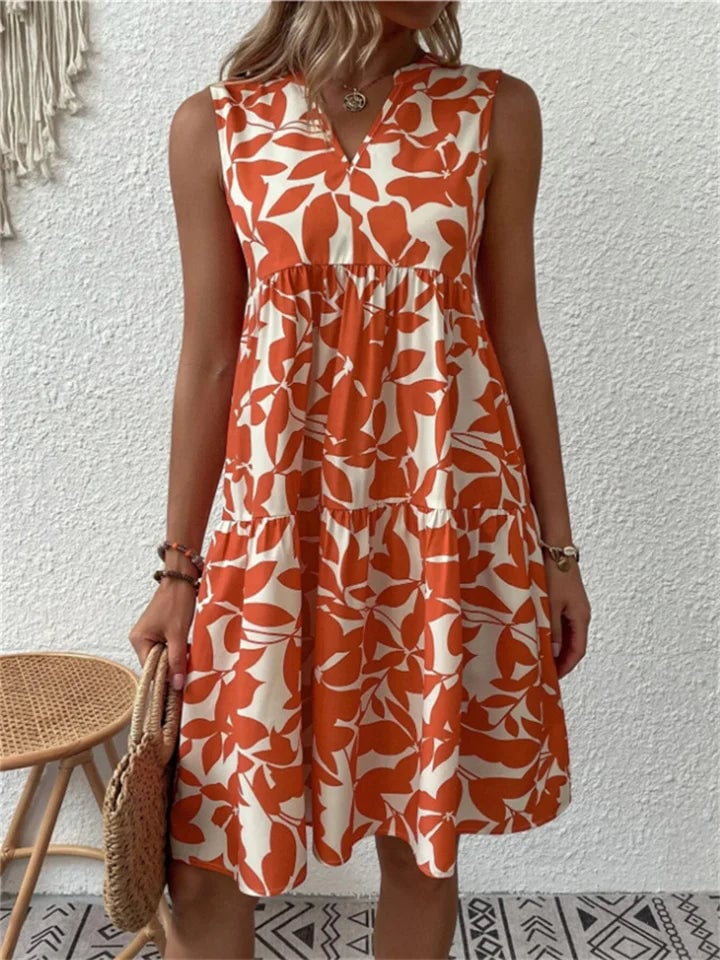 Model in the Beverly blooming flowy dress styled for a casual summer outing with a breezy, feminine look