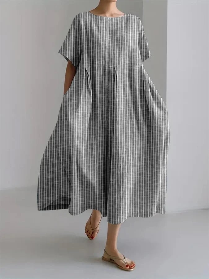 Close-up detail of the Bianca dress vertical stripe pattern in gray colorway