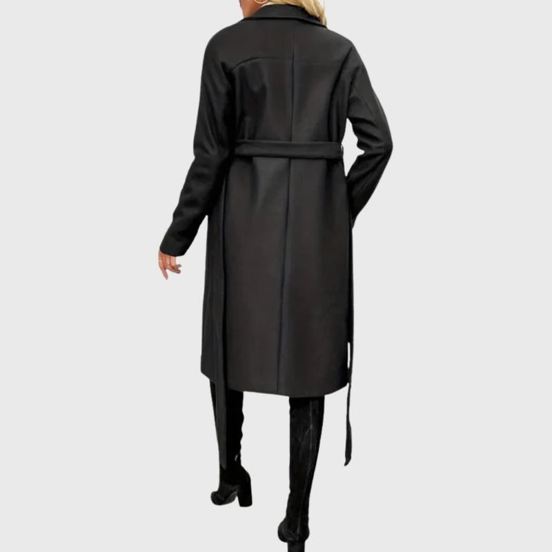 Back view of black longline winter trench coat showing full-length silhouette and clean tailored finish