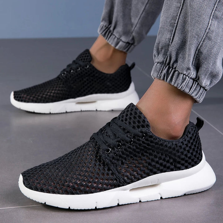 Bianca women's black mesh sneaker, front three-quarter view