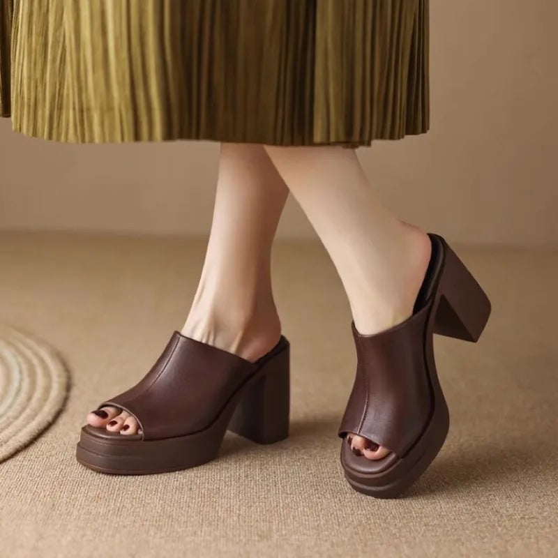 Bianca women's platform flat sandals in brown with structured straps and cushioned sole, front view