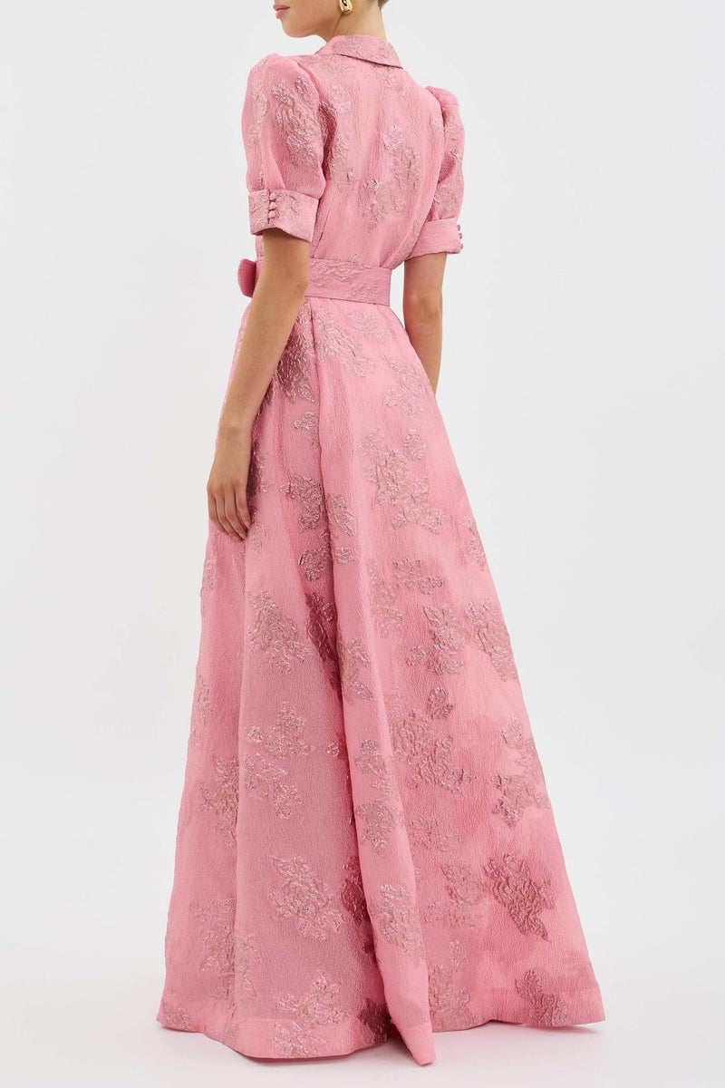 Close-up of the Bianca pink dress showing lapel neckline detail and lightweight fabric drape