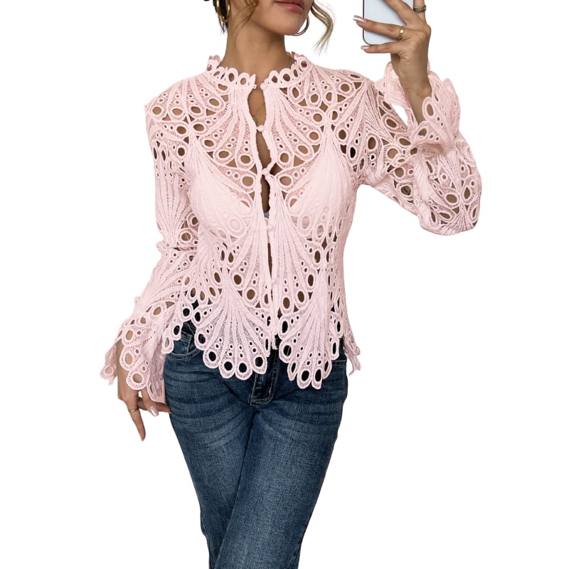 Woman styling the Bianca yellow lace cutwork blouse tucked into a high-waisted skirt