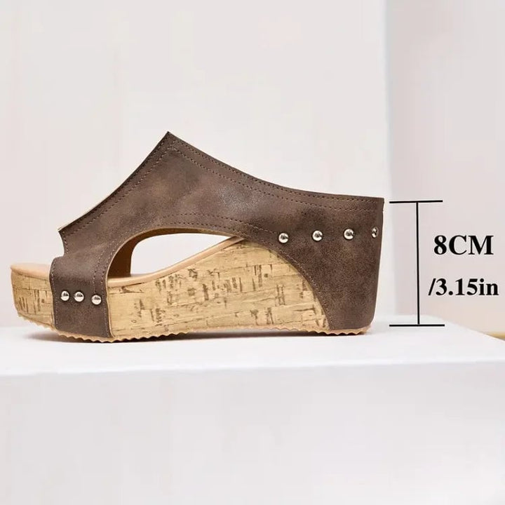 Pair of Birdie orthopedic sandals in beige shown from above on a neutral background