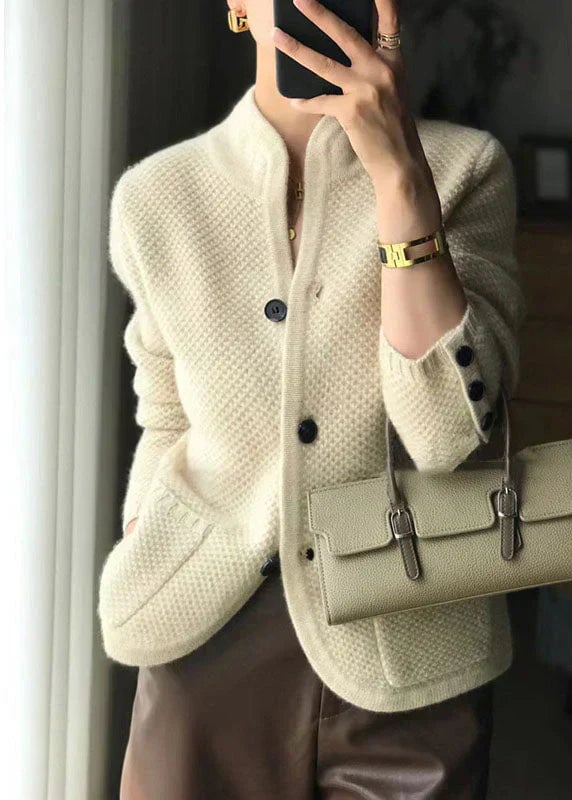 Side profile of a women's button-down cardigan showing smooth drape and fitted silhouette