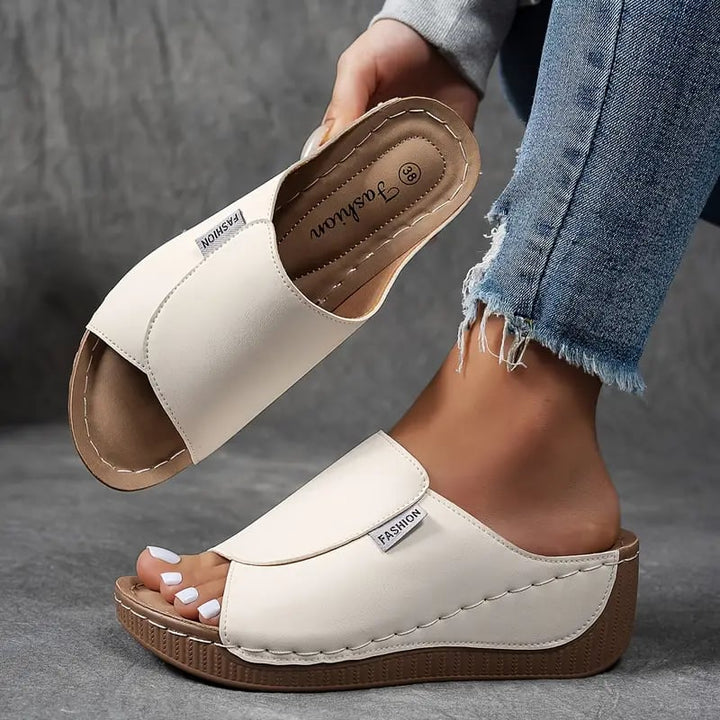 Blair women's arch support cushioned shoe in white with contoured footbed and adjustable strap, side view