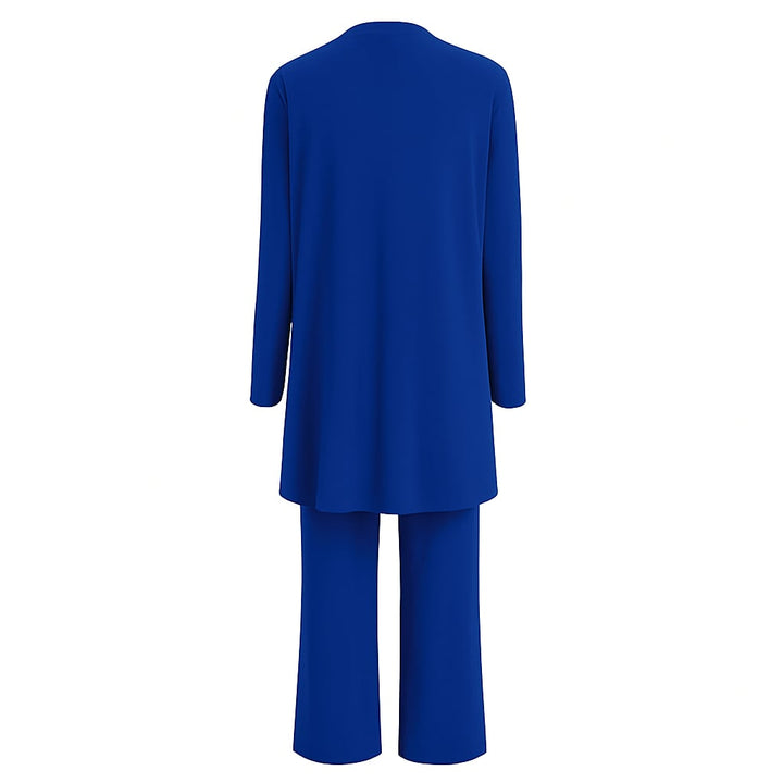 Woman wearing the Blair set in blue, styled casually with flat sandals