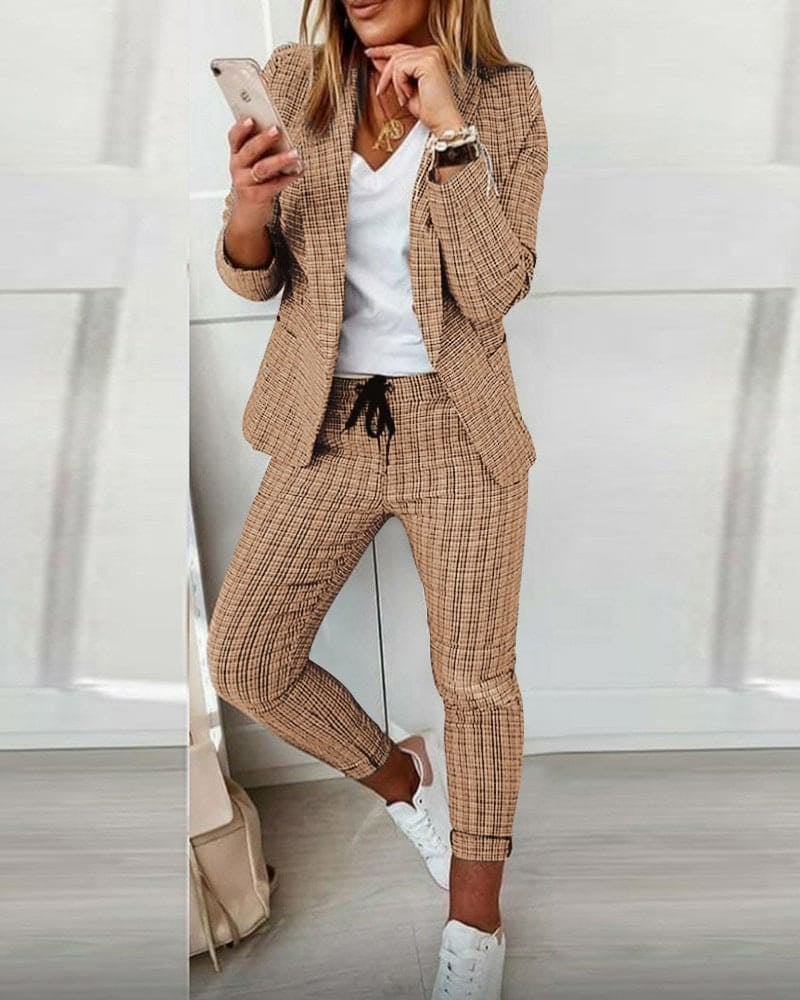 Close-up of small-check plaid pattern on tailored blazer jacket