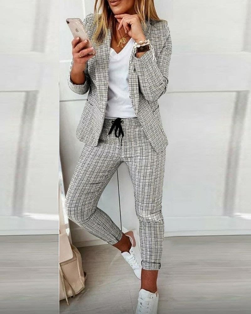 Model wearing Blair plaid blazer set in khaki, full-length front view