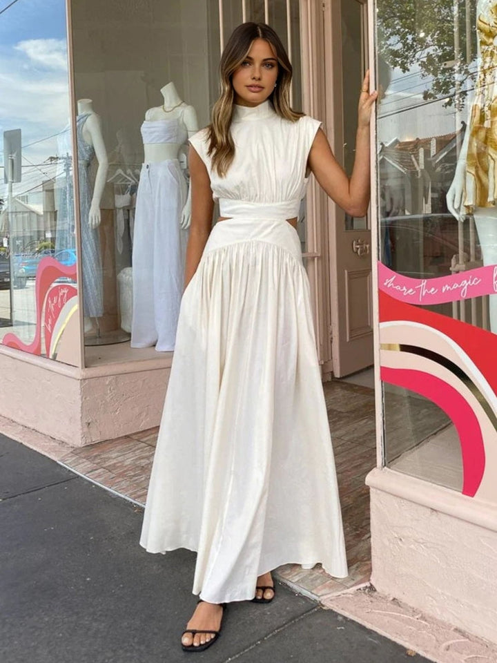 Khaki mock neck cutout maxi dress with padded shoulders, front view
