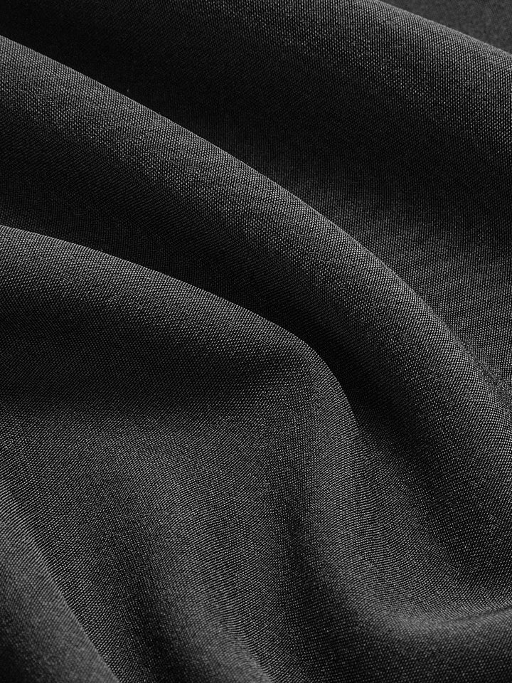 Purple cutout maxi dress side view showing waist detail and floor-length skirt