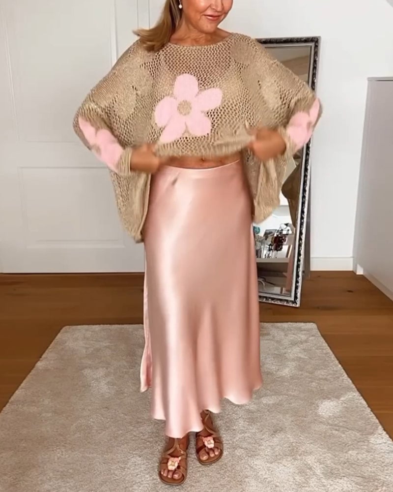 Side view of the Bloom crochet long sleeve top in pink showing relaxed oversized fit