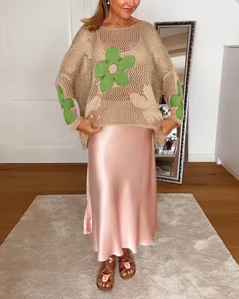 Model wearing the Bloom crochet top in green styled with wide-leg pants and sandals