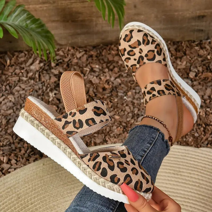Blossom platform sandal in blue, showcasing platform height and open toe design