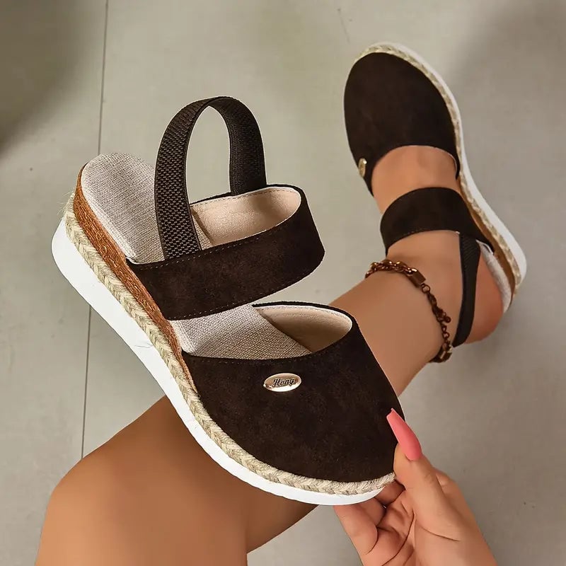 Close-up of Blossom sandal orthopedic cushioned sole and platform base
