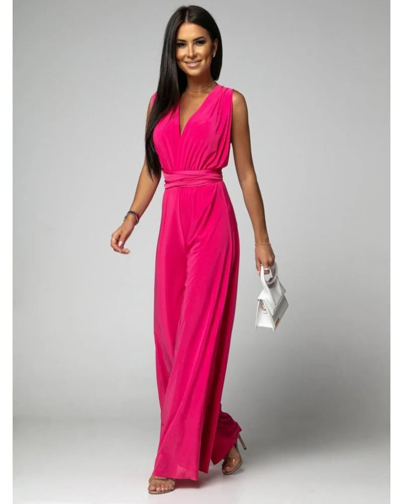 Close-up detail of ruched gathered waist and wrap tie straps on women's occasion jumpsuit