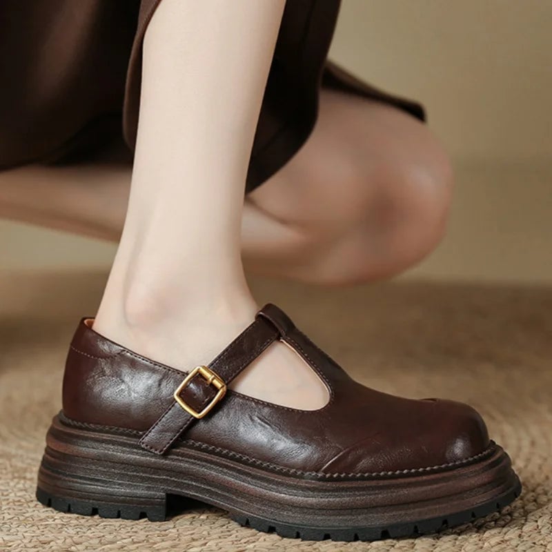 Blythe T-bar mary jane shoes in brown, top-down view highlighting perforated brogue trim
