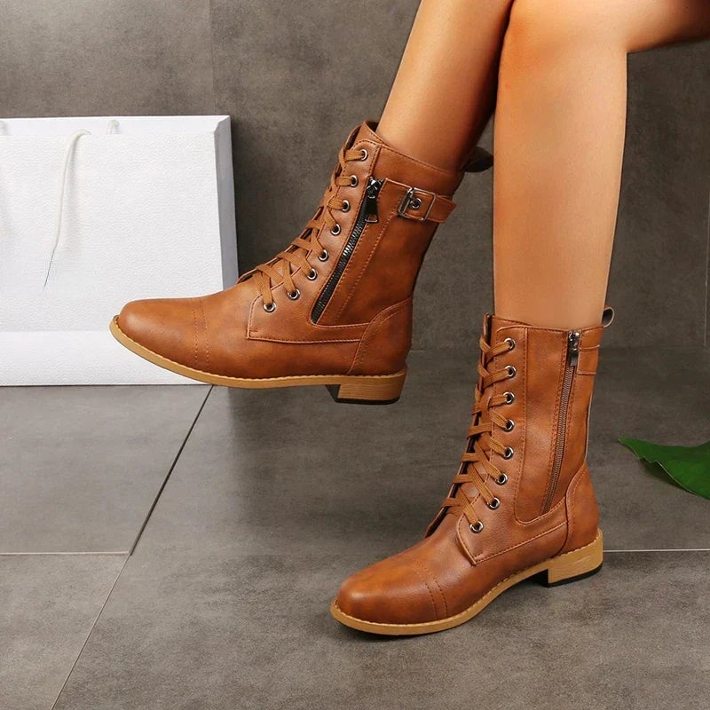 Front view of Brandy classic women's boots in brown with a sleek, polished silhouette