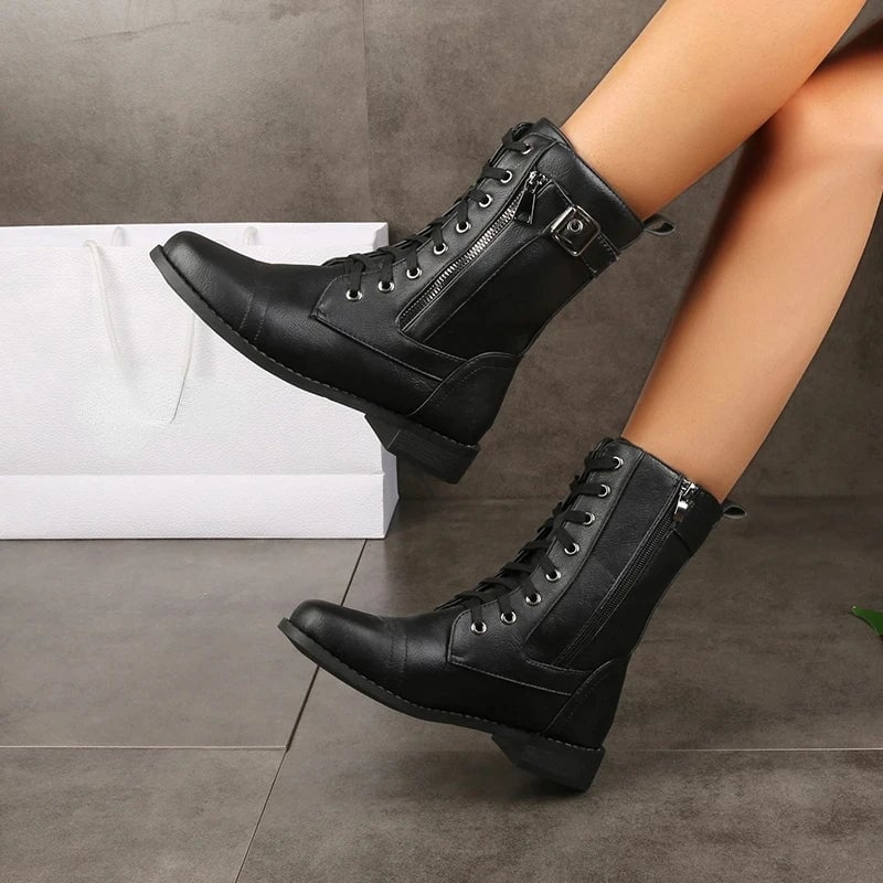 Side profile of Brandy classic women's boots in black showing streamlined boot design