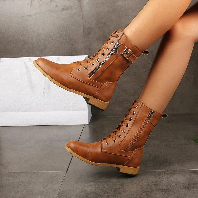 Brandy classic boots in gray styled with slim-fit jeans for a casual everyday look
