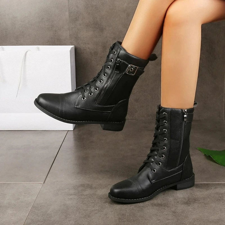 Overhead flat-lay of Brandy boots in all three colorways — brown, black, and gray