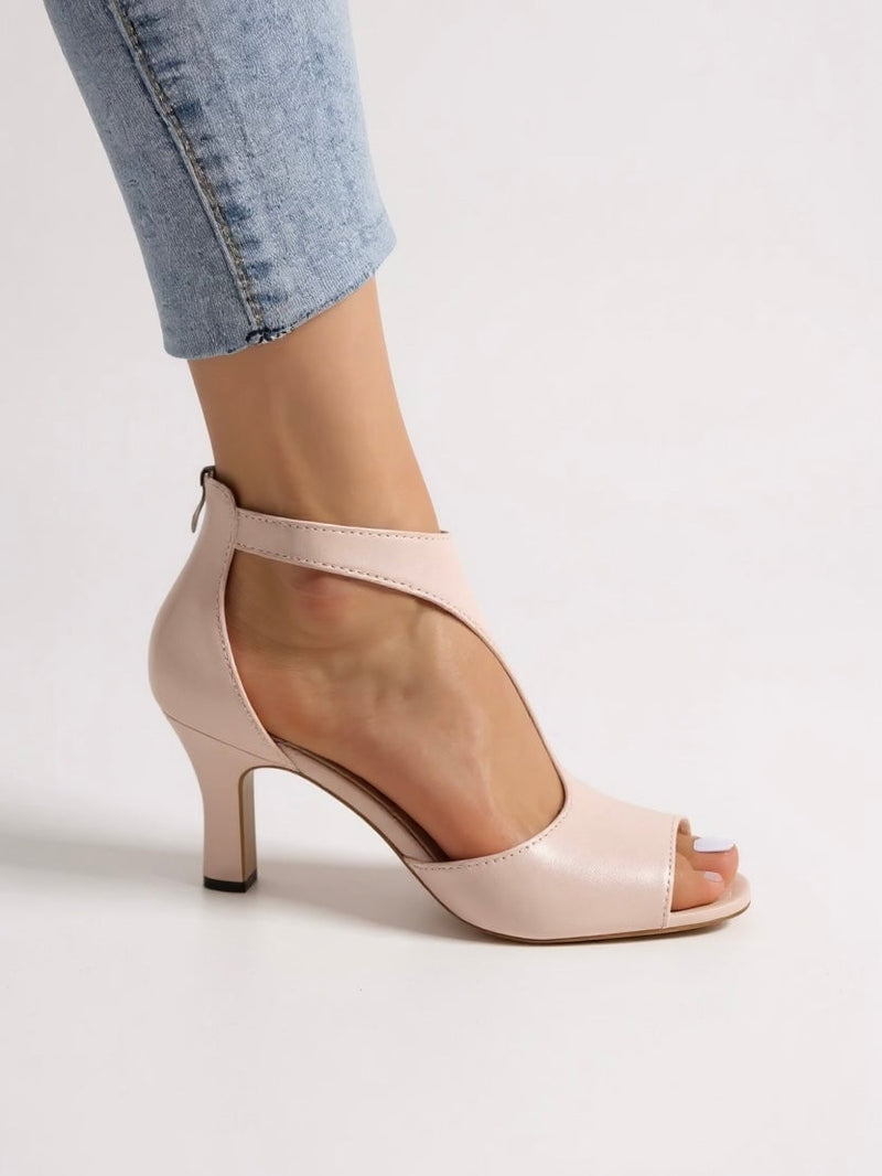 Bree cutout block heel sandals in pink, side profile showing breathable design and heel height