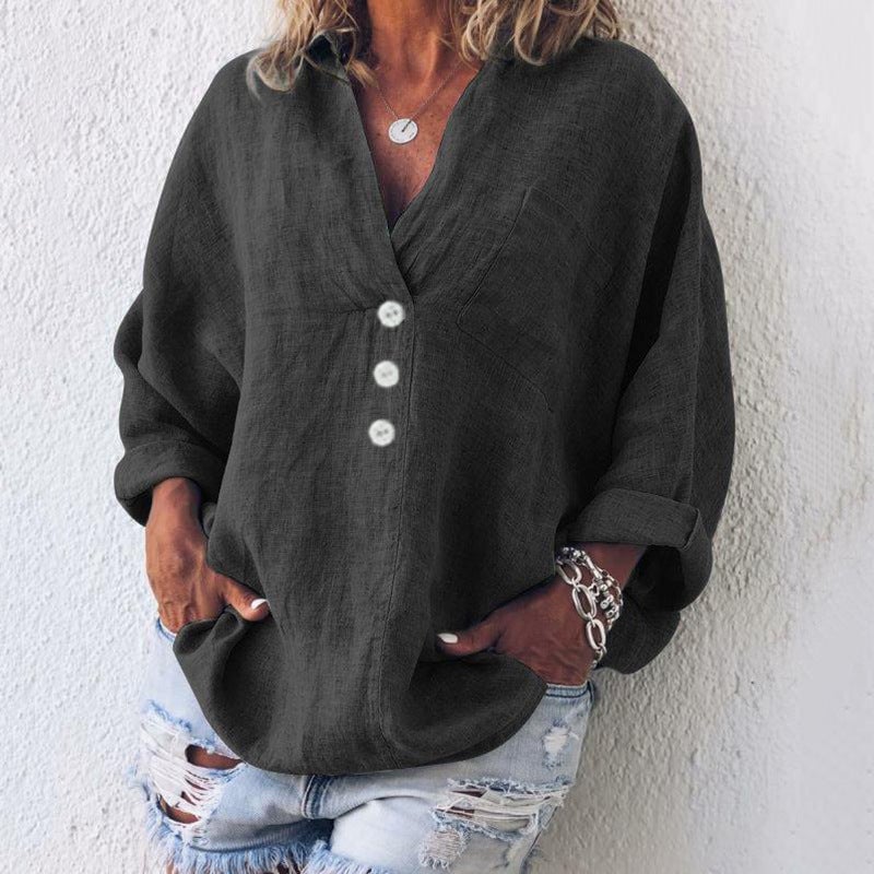 Front detail of the Breeze top showing the v-neck button placket and chest patch pocket in khaki