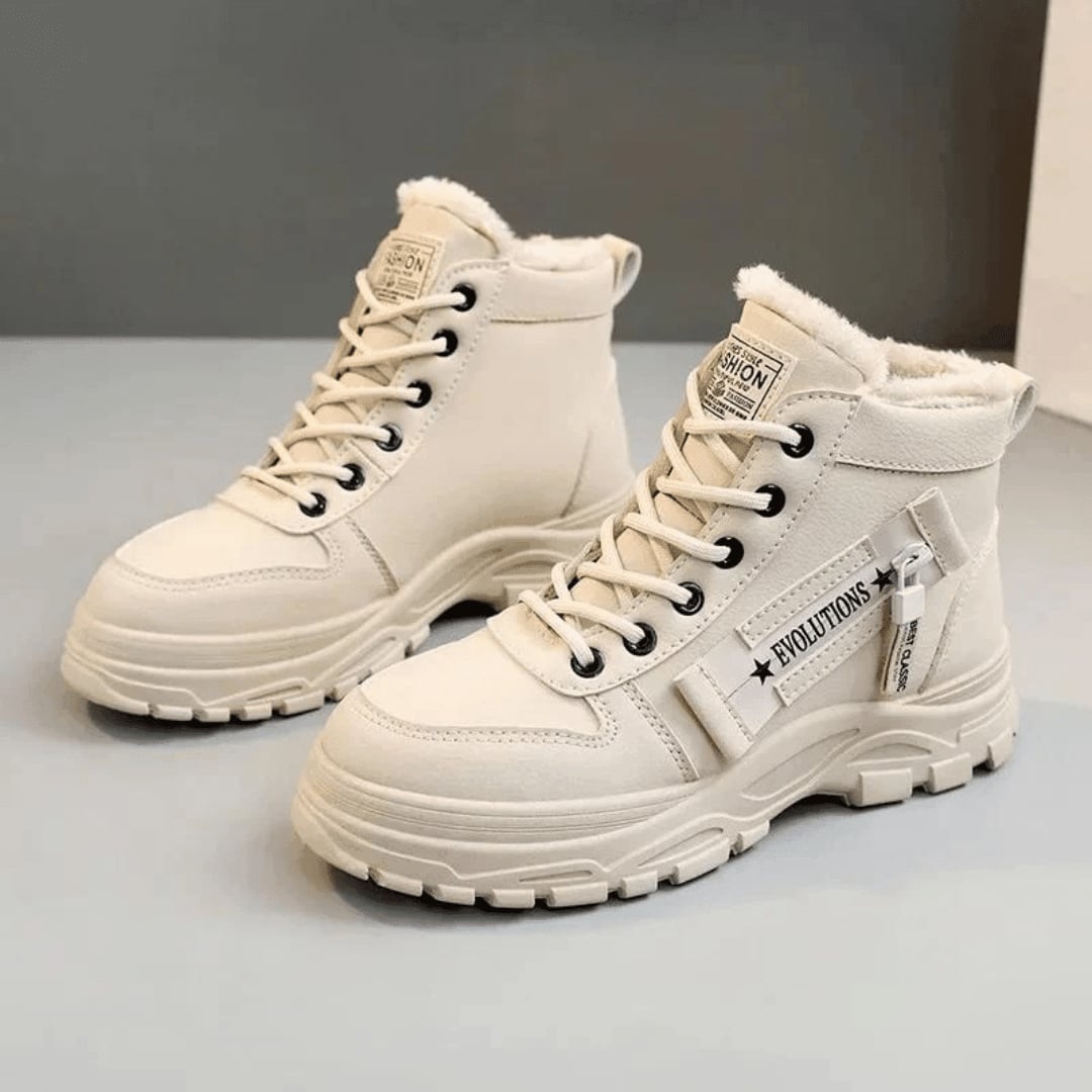 Women's waterproof winter boot in a neutral colorway shown from a front three-quarter angle