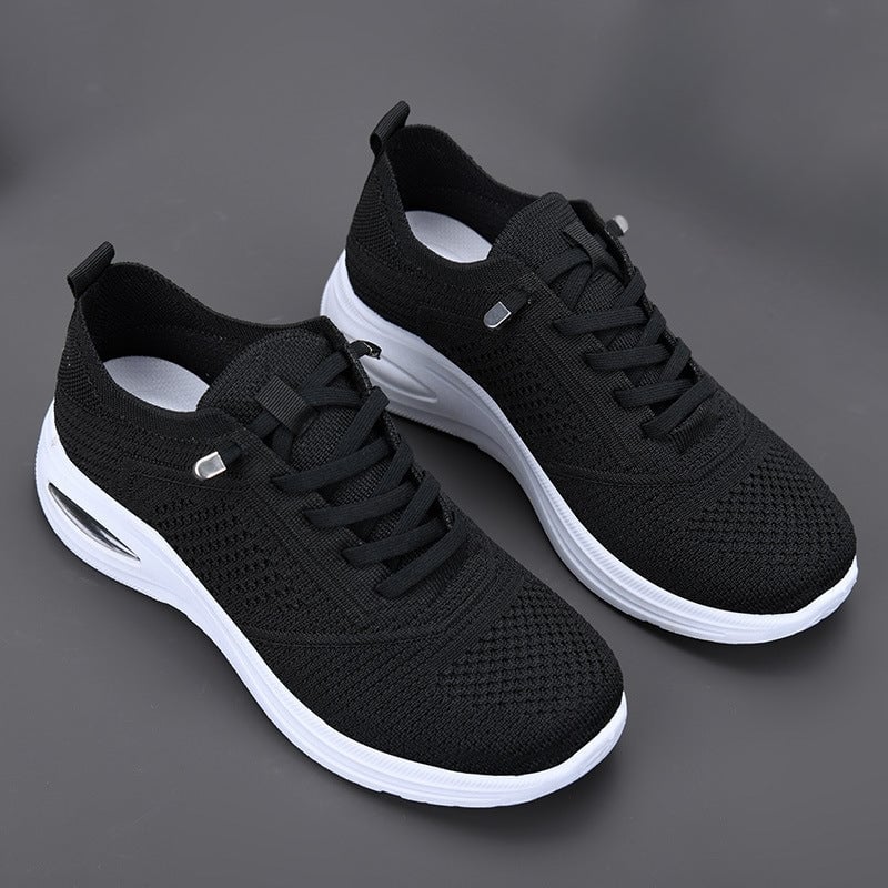 Women's blue mesh lace-up sneakers with white midsole on a clean background