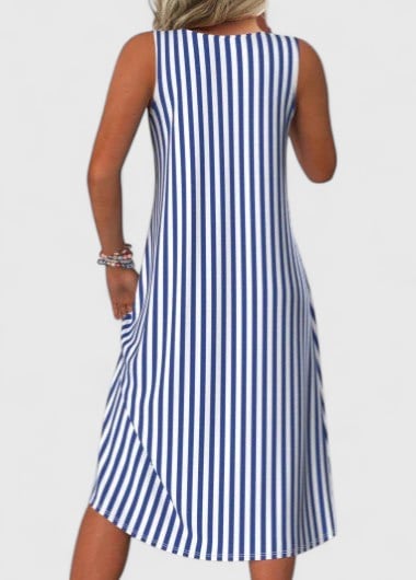 Close-up detail of the panelled diagonal and vertical stripe blocking on a blue and white sleeveless midi dress