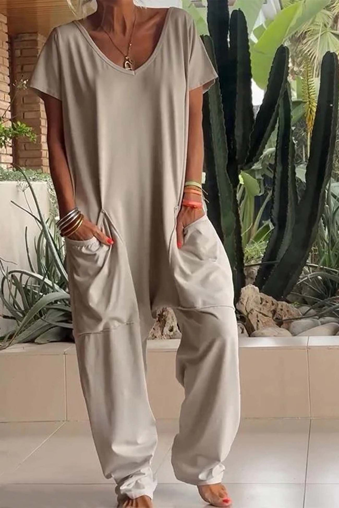 Close-up of the oversized front pockets on the Florimay Breezy loose jumpsuit in gray