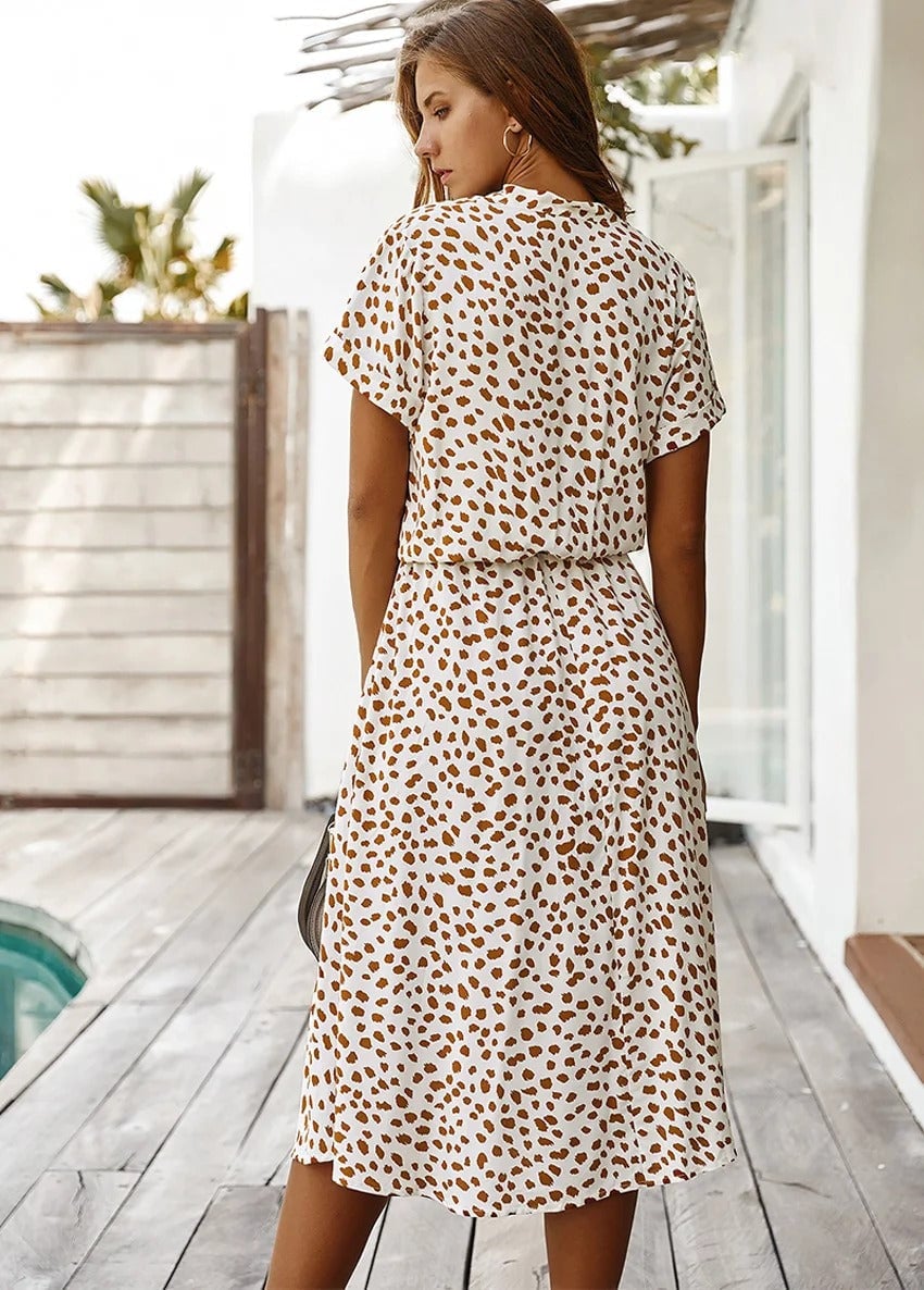 Model wearing the Brenda summer dress in black colorway highlighting its versatile everyday style