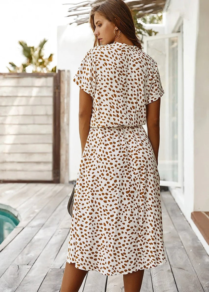 Model wearing the Brenda summer dress in black colorway highlighting its versatile everyday style