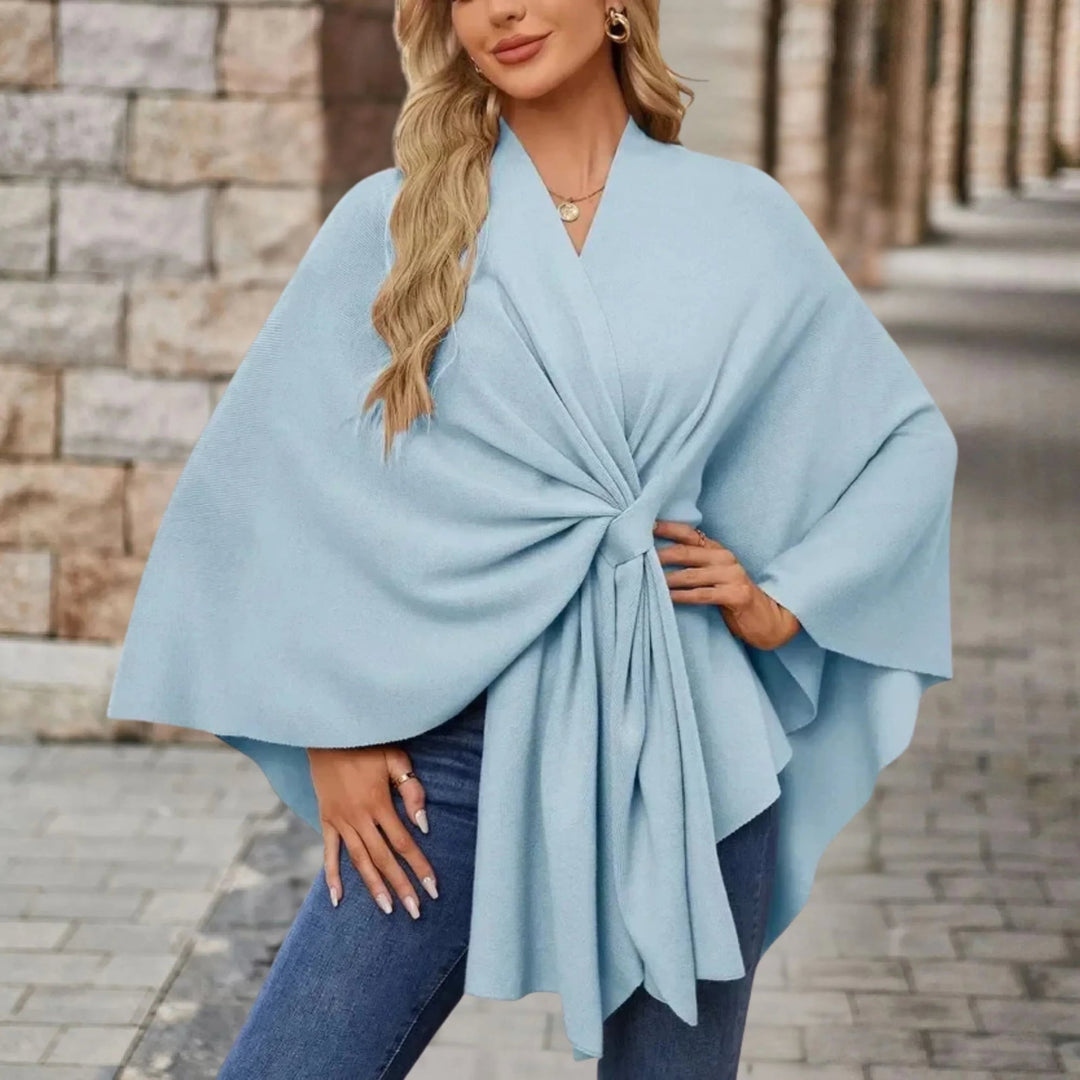 Close-up of the front knot detail on a soft draped poncho