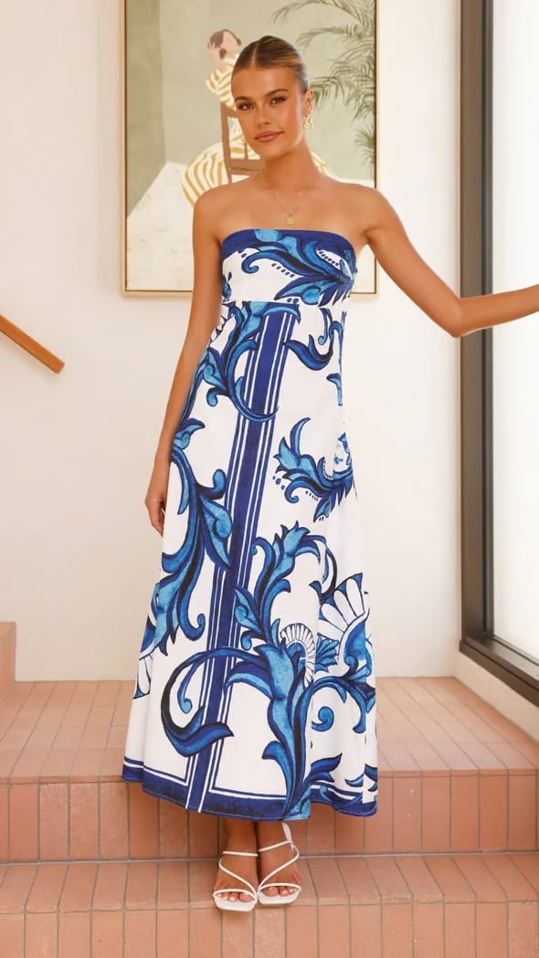 Front view of the Briar printed dress in blue showing the vintage-inspired pattern and sleek fit