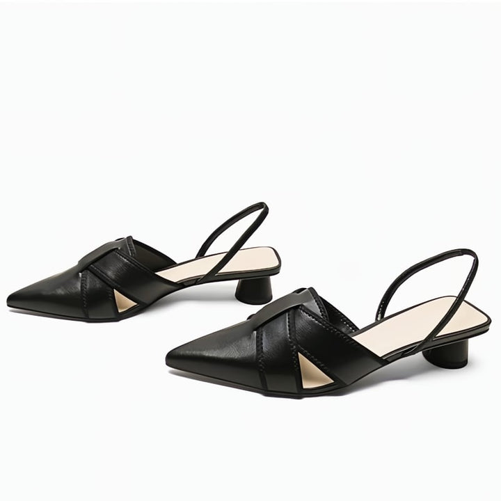 Bridgette low heel flat sandals in black, side profile showing cushioned insole and gentle heel lift