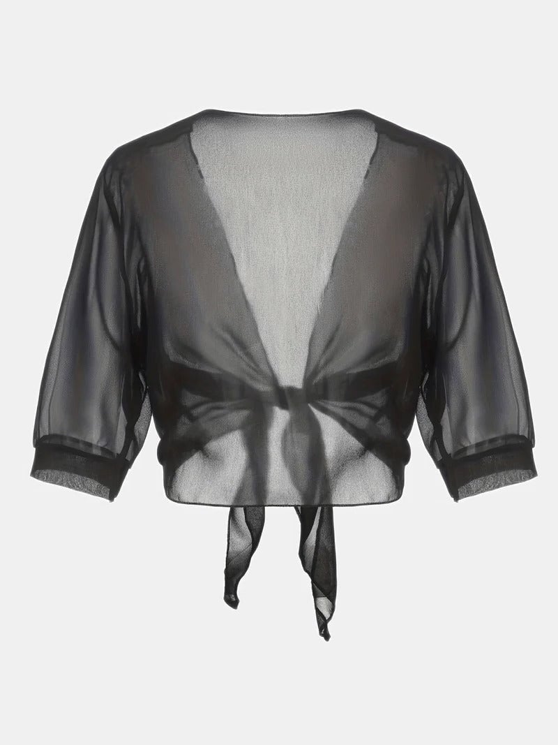 Front view of the Brisa open-front tie blouse in purple layered over a slip