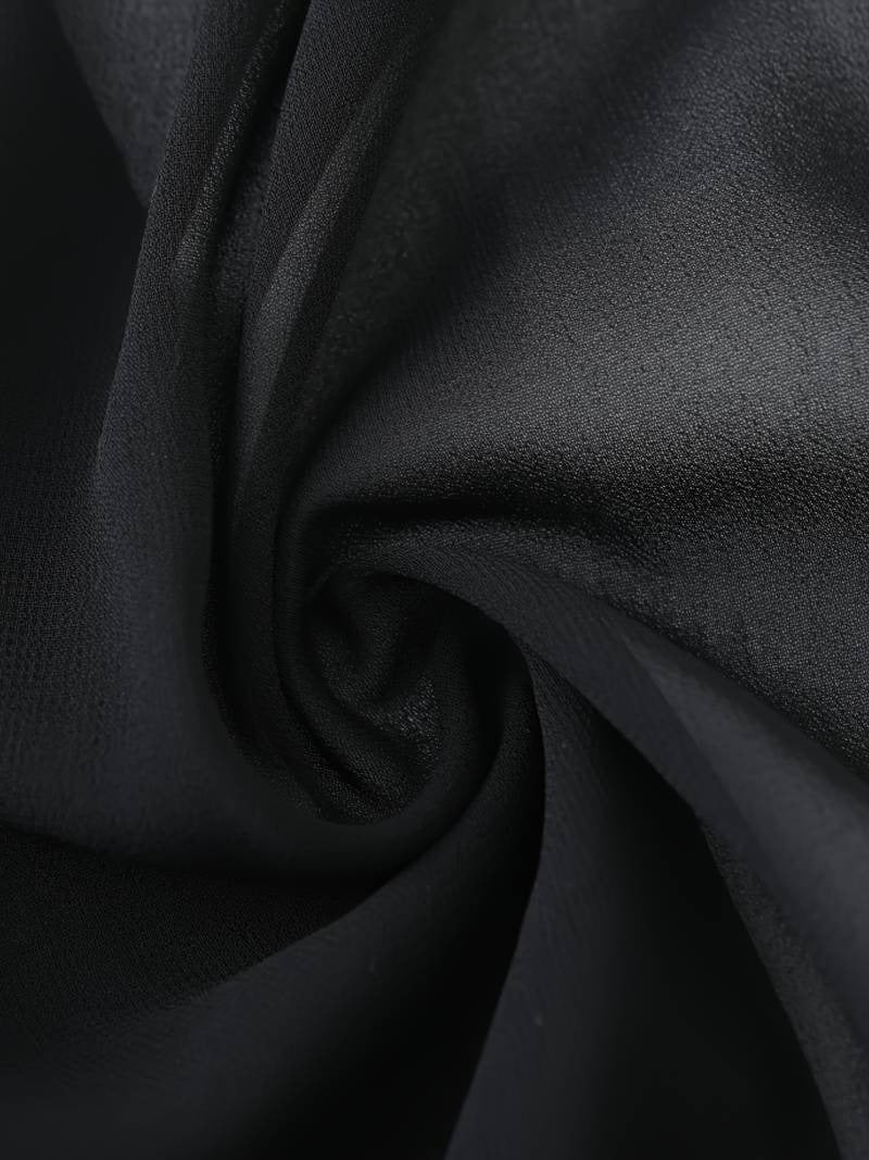 Side view of the Brisa lightweight blouse in purple showing the open-front silhouette