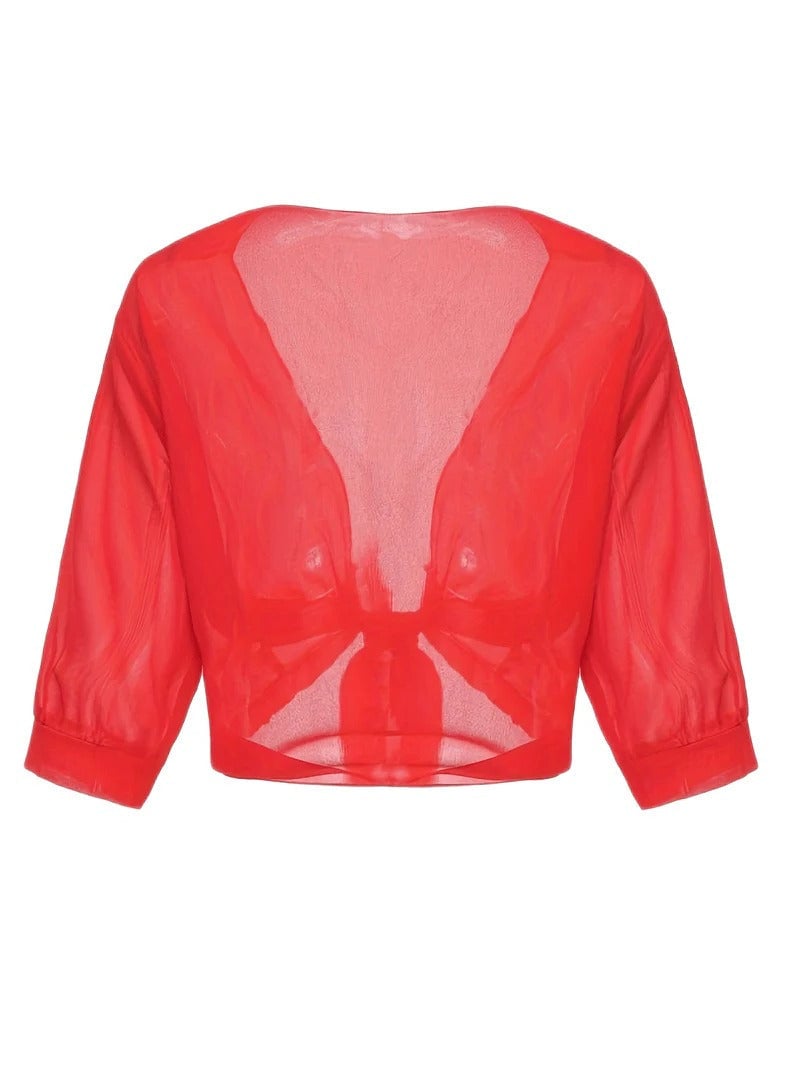 Front view of the Brisa open-front blouse in light blue over a white cami